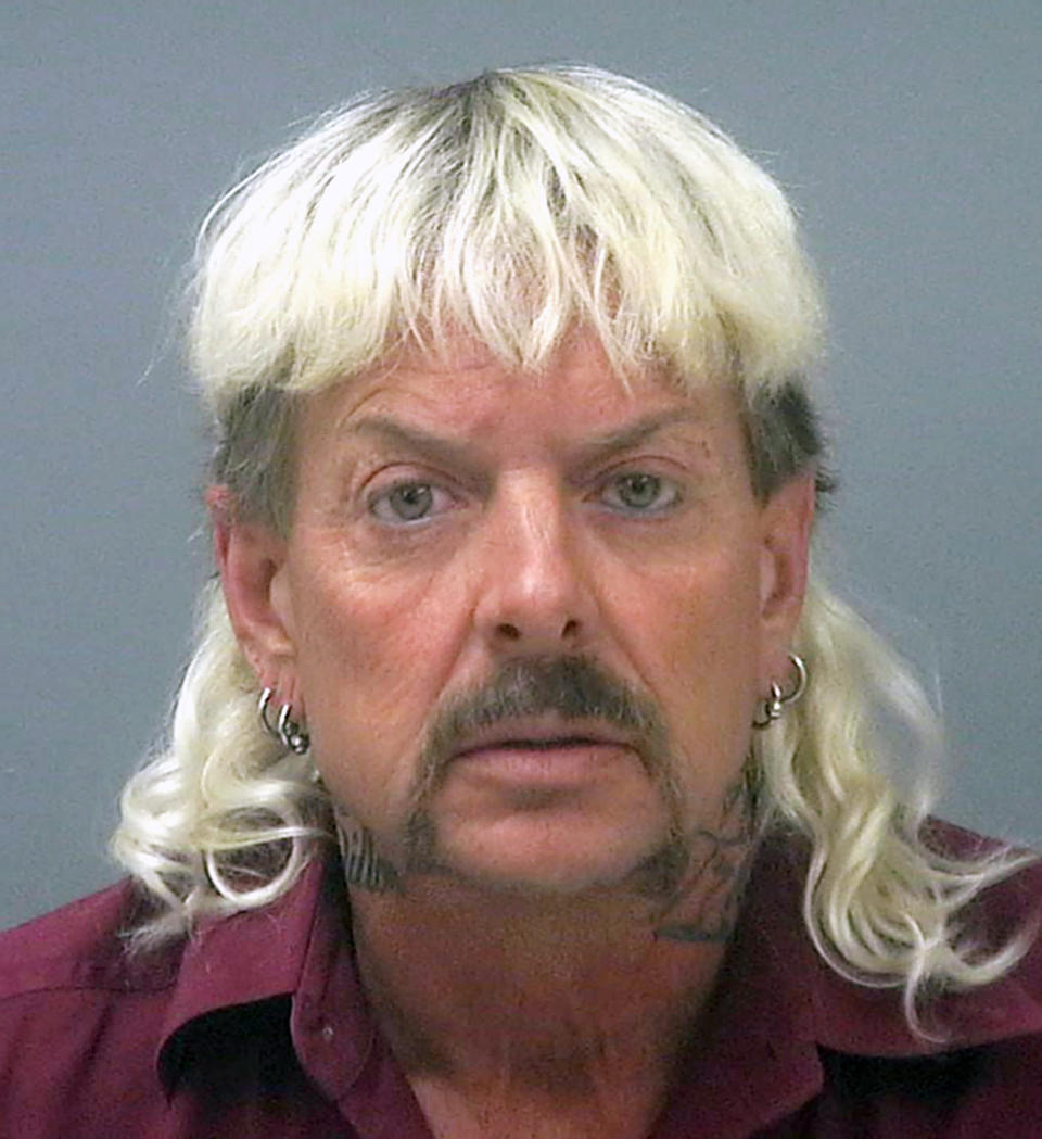 FILE - This undated file photo provided by the Santa Rose County Jail in Milton, Fla., shows Joseph Maldonado-Passage, also known as Joe Exotic. A federal judge in Oklahoma has awarded ownership of the zoo made famous in Netflix's “Tiger King” docuseries to Joe Exotic's rival, Carole Baskin. In a ruling Monday, June 1, 2020, U.S. District Judge Scott Palk granted control of the Oklahoma zoo that was previously run by Joseph Maldonado-Passage — also known as Joe Exotic — to Big Cat Rescue Corp. (Santa Rosa County Jail via AP, File)