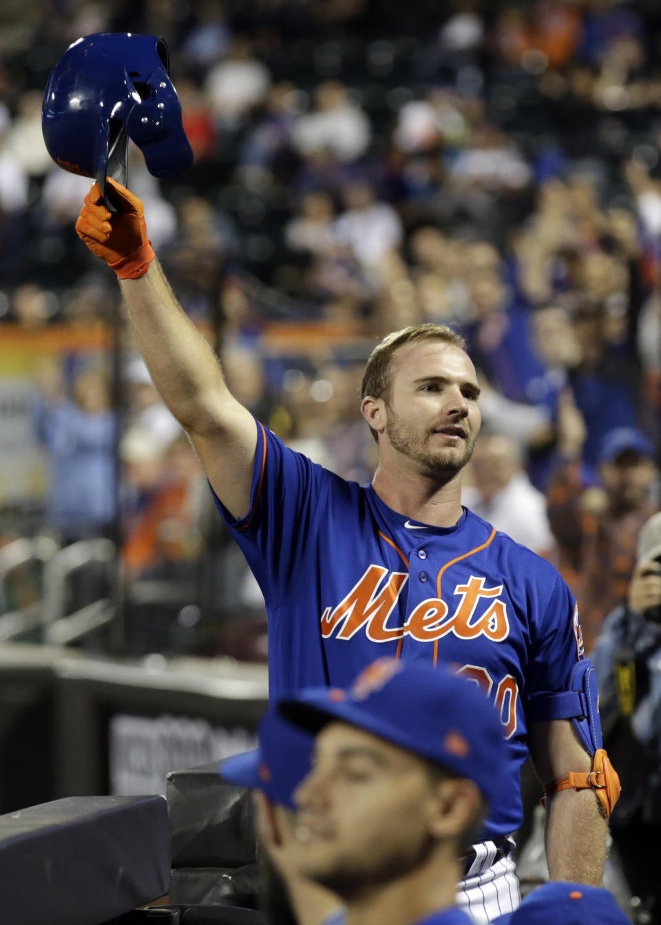 New York Mets' Pete Alonso takes a curtain call after hitting his 52nd home run of the season during the first inning of a baseball game against the Atlanta Braves, Friday, Sept. 27, 2019, in New York. (AP Photo/Adam Hunger)