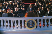 <p>President John F. Kennedy makes his inauguration speech from the balcony of the White House in Washington, Jan. 20, 1961. (Photo: Bettmann Archive/Getty Images) </p>