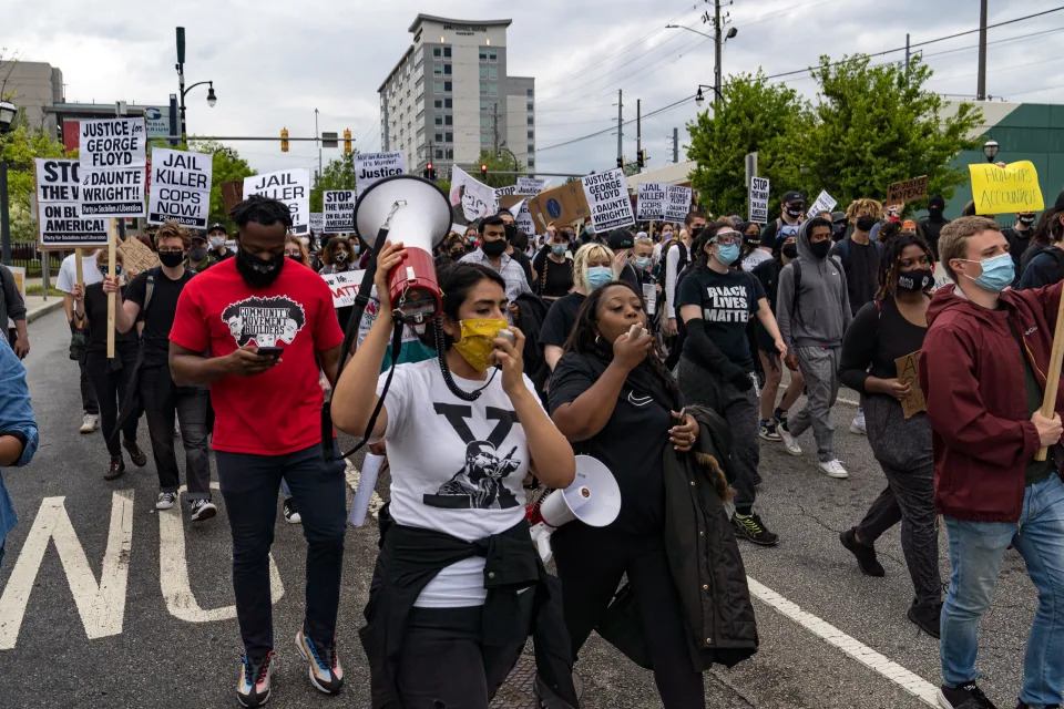 Demonstrators march in Atlanta, Georgia, in 2021 to protest the shooting death of Daunte Wright.