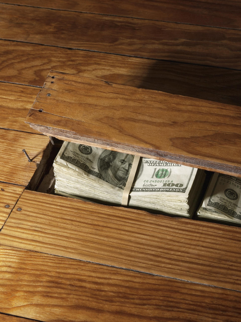 cash hidden in a floorboard