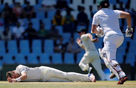 Cricket - New Zealand v South Africa - second cricket test match - Centurion Park , Centurion , South Africa - 28/8/2016 New Zealand's Tim Southee lies on the crease after he fell while attempting to field a ball. REUTERS/Siphiwe Sibeko