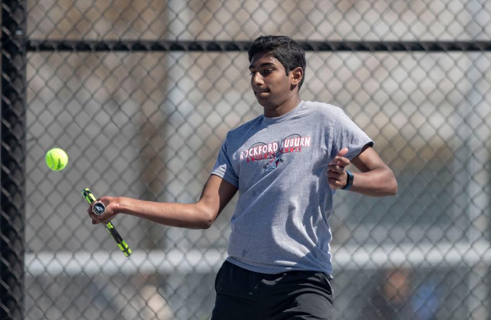 Auburns Sharankumar Kamaraj hits the ball in a singles match on on Saturday, May 7, 2022, at Harlem High School in Machesney park.