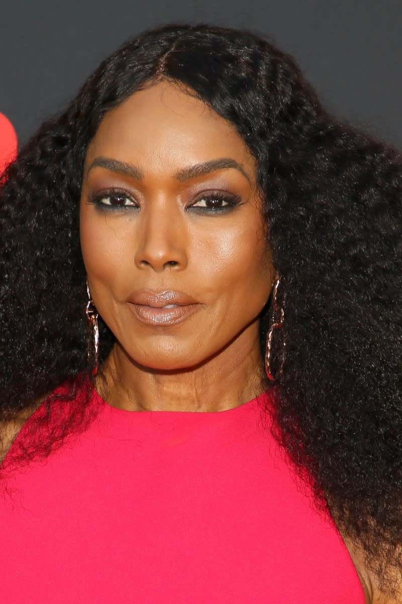 Angela Bassett pictured with black eyeliner