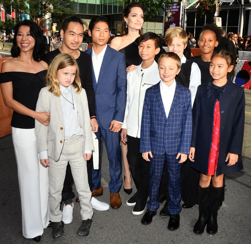 Jolie's whole family <a href="http://people.com/movies/angelina-jolie-first-they-killed-my-father-premiere-all-six-kids/" rel="nofollow noopener" target="_blank" data-ylk="slk:joined her on Sept. 11, 2017,;elm:context_link;itc:0;sec:content-canvas" class="link ">joined her on Sept. 11, 2017,</a> at the Toronto International Film Festival premiere of her movie <em>First They Killed My Father. </em> Wearing a one-shoulder black Ralph & Russo dress, the proud mom was all smiles on the red carpet as she put her arms around her sons Pax and Maddox, who both worked behind the scenes on the movie. The trio was also accompanied by Zahara, Shiloh and twins Knox and Vivienne.