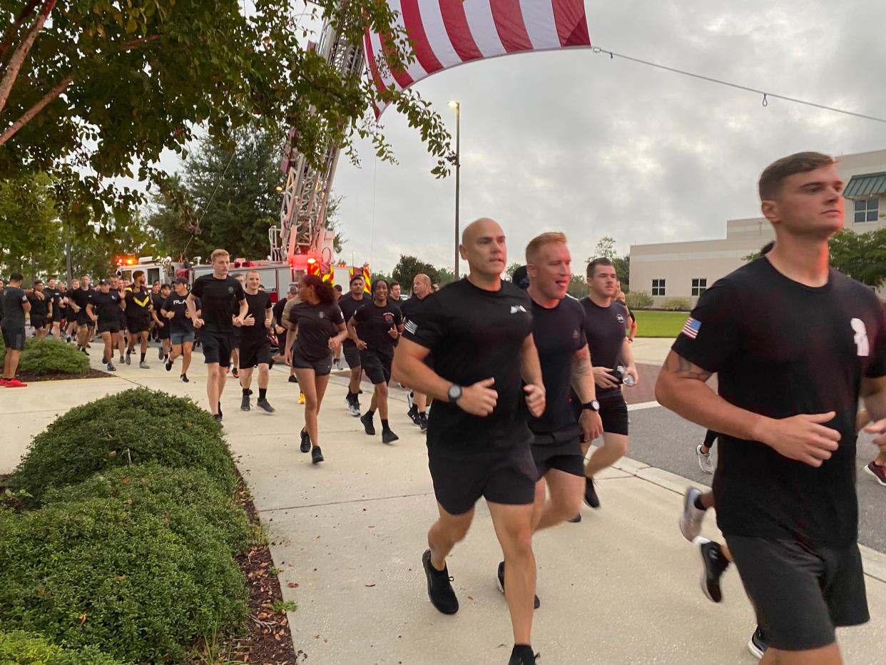 A little more than 1,000 soldiers, families and alumni of the Army 7th Special Forces Group (Airborne) completed a 9.11 kilometer run Friday to honor victims of the Sept. 11, 2001, attacks and those killed in action. After 9/11, members of the 7th Group were deployed in support of Operation Enduring Freedom and Iraqi Freedom for 20 years.