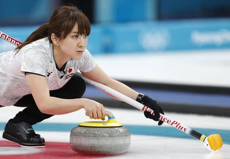 Curling - Pyeongchang 2018 Winter Olympics - Women's Bronze Medal Match - Britain v Japan - Gangneung Curling Center - Gangneung, South Korea - February 24, 2018 - Second Yumi Suzuki of Japan delivers the stone. REUTERS/John Sibley