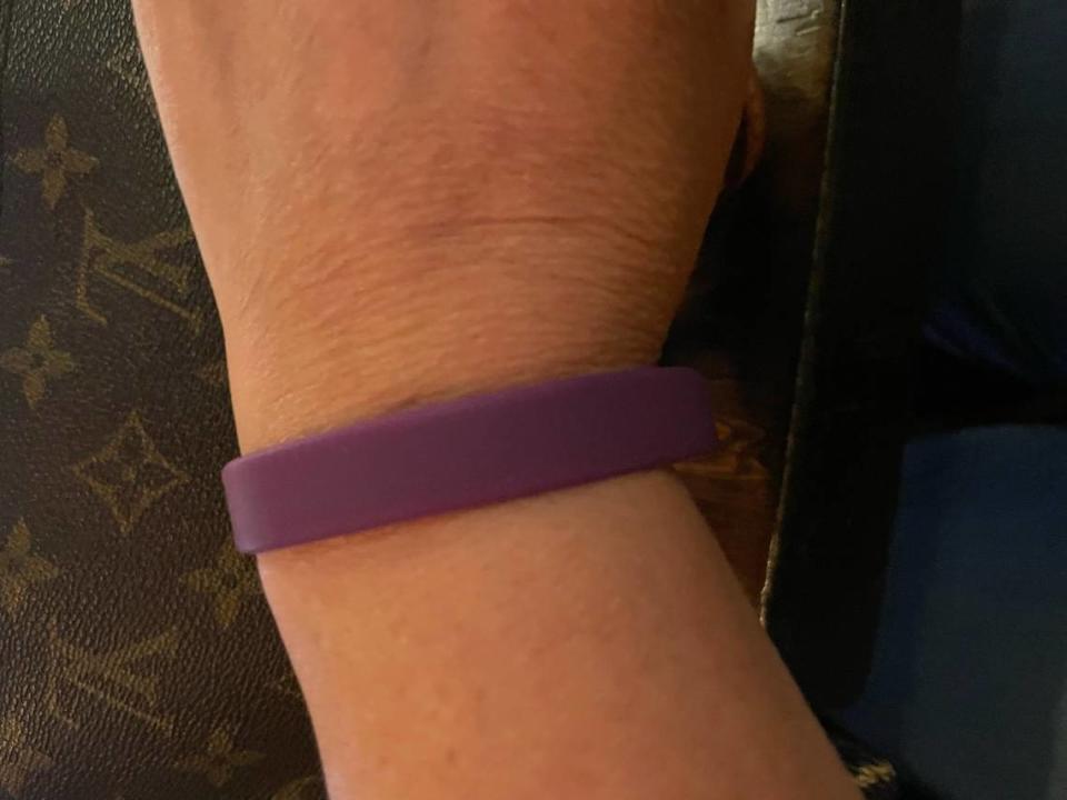 Royal Caribbean International passenger Laura Angelo said the company incorrectly gave her a plastic purple wristband meant for vaccinated passengers during the July 5 boarding process for the Freedom the Seas ship in Miami.