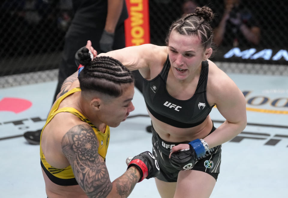 LAS VEGAS, NEVADA – FEBRUARY 18: (R-L) Erin Blanchfield punches Jessica Andrade of Brazil in a flyweight fight during the UFC Fight Night event at UFC APEX on February 18, 2023 in Las Vegas, Nevada. (Photo by Jeff Bottari/Zuffa LLC via Getty Images)