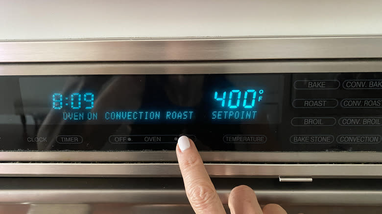 finger setting oven to 400