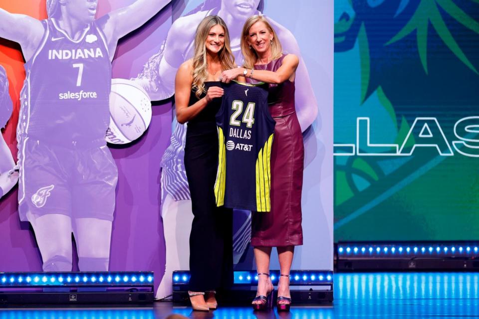 PHOTO: Jacy Sheldon poses with WNBA Commissioner Cathy Engelbert after being selected fifth overall pick by the Dallas Wings during the 2024 WNBA Draft at Brooklyn Academy of Music on April 15, 2024 in New York City.  (Sarah Stier/Getty Images)