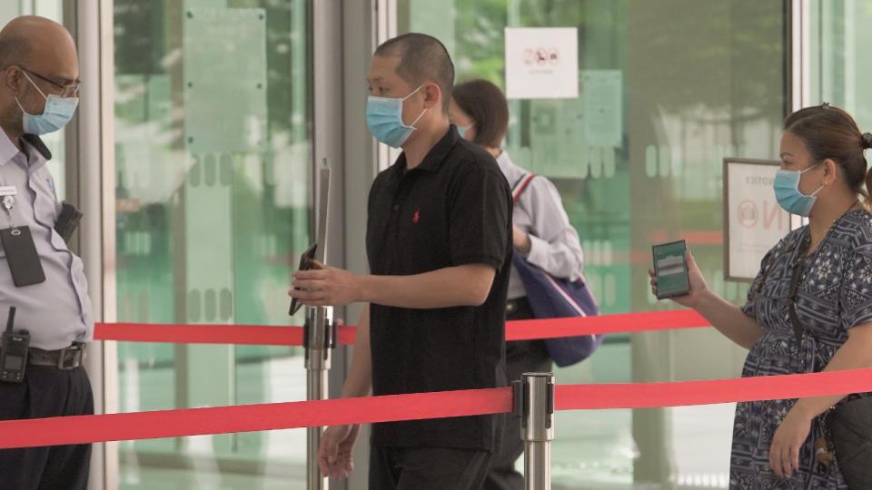 Teppei Yamashita entering the State Courts on 18 February. (PHOTO: Yahoo News Singapore/Nick Tan)