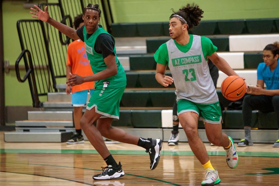 December 6, 2021; Chandler, AZ; AZ Compass Prep varsity basketball player, junior, Kylan Boswell, 23, and junior, Mookie Cook, 1, practice at the AZ Compass Prep gymnasium the week of the Hoophall West tournament