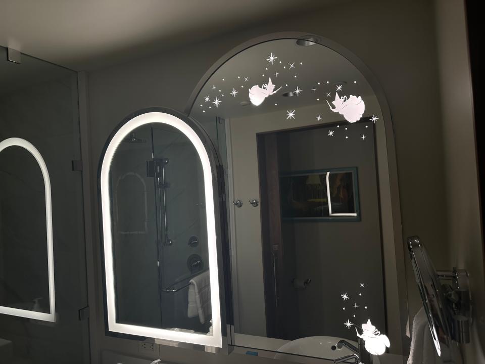 Arched mirrors in sleeping beauty deluxe studio with light-up fairy design