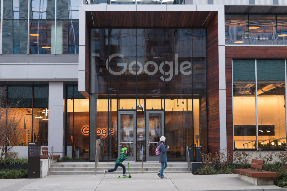 Seattle, USA - Jan 22, 2022: The new Google campus in the south lake union late in the day as a people pass.