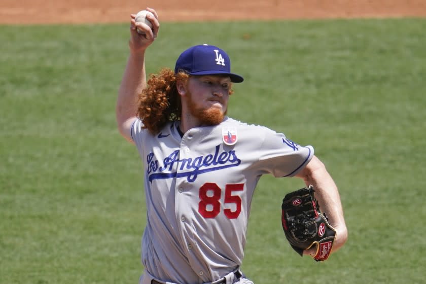 Los Angeles Dodgers starting pitcher Dustin May throws to the Los Angeles Angels.