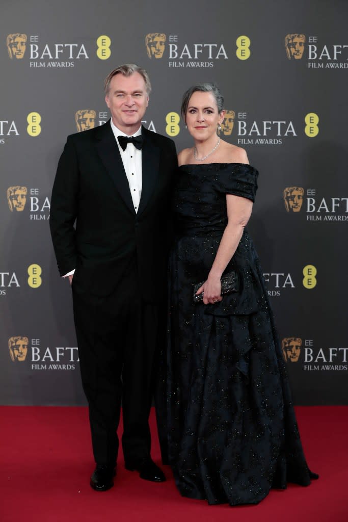 Christopher Nolan (L) and Emma Thomas attends the 2024 EE BAFTA Film Awards at The Royal Festival Hall on February 18, 2024 in London, England.