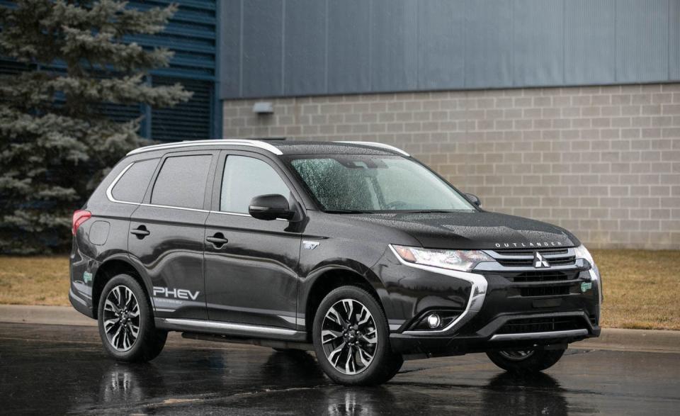 <p>At long last, Mitsubishi introduced <a rel="nofollow noopener" href="https://www.caranddriver.com/reviews/2018-mitsubishi-outlander-phev-test-review" target="_blank" data-ylk="slk:the Outlander plug-in hybrid;elm:context_link;itc:0;sec:content-canvas" class="link ">the Outlander plug-in hybrid</a> sold elsewhere in the world (for years!) to the U.S. market for 2018. In spite of its relative age (Mitsubishi gave its hybridized SUV <a rel="nofollow noopener" href="https://www.caranddriver.com/news/2019-mitsubishi-outlander-phev-gets-powertrain-tweaks-updated-styling" target="_blank" data-ylk="slk:a visual refresh for 2019;elm:context_link;itc:0;sec:content-canvas" class="link ">a visual refresh for 2019</a>), the Outlander PHEV remains the plug-in SUV with the longest electric-only driving range available, 22 miles.</p>