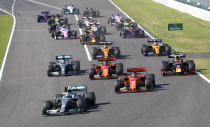 Mercedes driver Valtteri Bottas of Finland leads the field into turn one at the start of the Japanese Formula One Grand Prix at Suzuka Circuit in Suzuka, central Japan, Sunday, Oct. 13, 2019. (AP Photo/Toru Hanai)