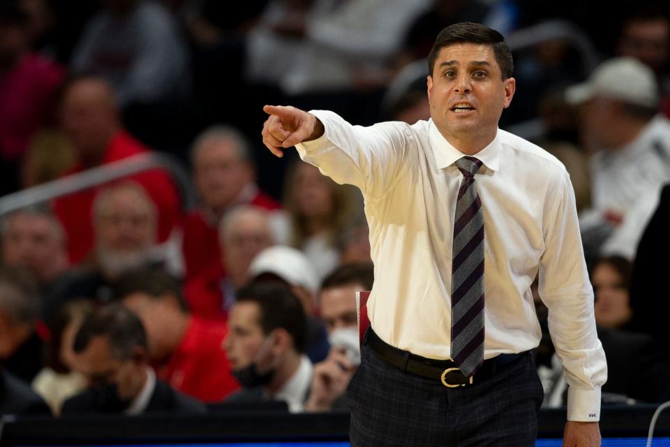 Cincinnati Bearcats head coach Wes Miller points in the first half of the NCAA men's basketball game between the Cincinnati Bearcats and the Georgia Bulldogs on Saturday, Nov. 13, 2021, at Fifth Third Arena in Cincinnati. 