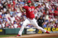 Cincinnati Reds starting pitcher Wade Miley (22) delivers during the first inning of a baseball game against the Los Angeles Dodgers in Cincinnati, Sunday, Sept 19, 2021. (AP Photo/Bryan Woolston)