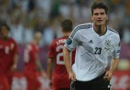 German forward Mario Gomez (R) celebrates after scoring a goal during the Euro 2012 championships football match Germany vs Portugal on June 9, 2012 at the Arena Lviv. AFP PHOTO / PATRIK STOLLARZPATRIK STOLLARZ/AFP/GettyImages