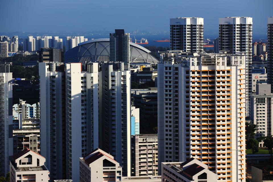 SINGAPORE - JANUARY 05:  A general view of a public housing flats, private and commercial buildings with the National Stadium in the background on January 5, 2020 in Singapore.  (Photo by Suhaimi Abdullah/Getty Images)