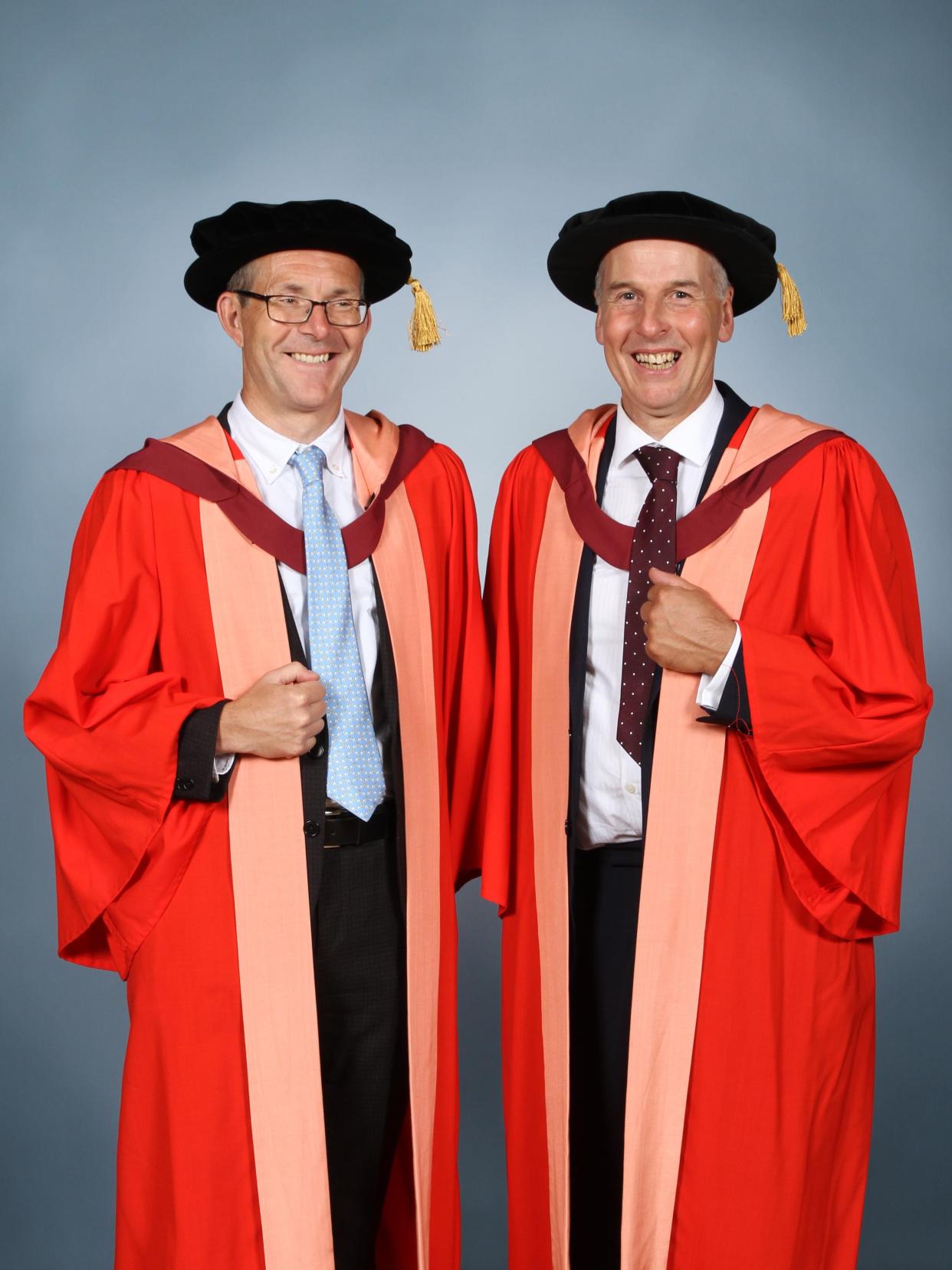 John Volanthen and Rick Stanton recieve their honorary degrees from the University of Bristol (University of Bristol/PA)