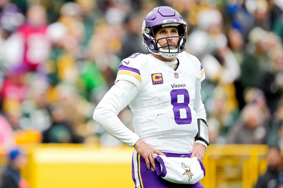 GREEN BAY, WISCONSIN - OCTOBER 29: Kirk Cousins #8 of the Minnesota Vikings looks on during the first half of a game against the Green Bay Packers at Lambeau Field on October 29, 2023 in Green Bay, Wisconsin. (Photo by Patrick McDermott/Getty Images)