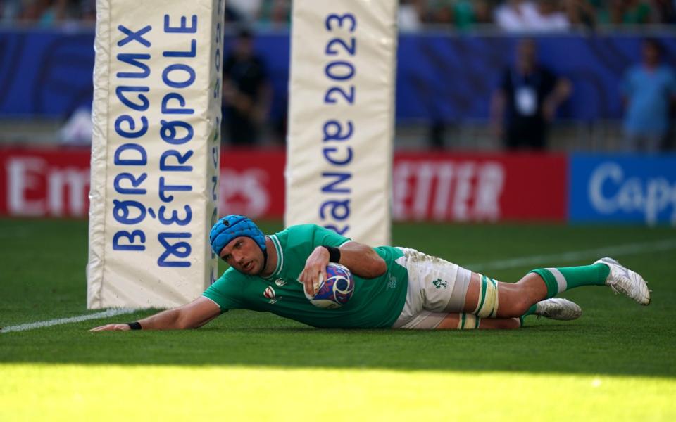 Second-row Tadhg Beirne covers the length of the field before collapsing over the line