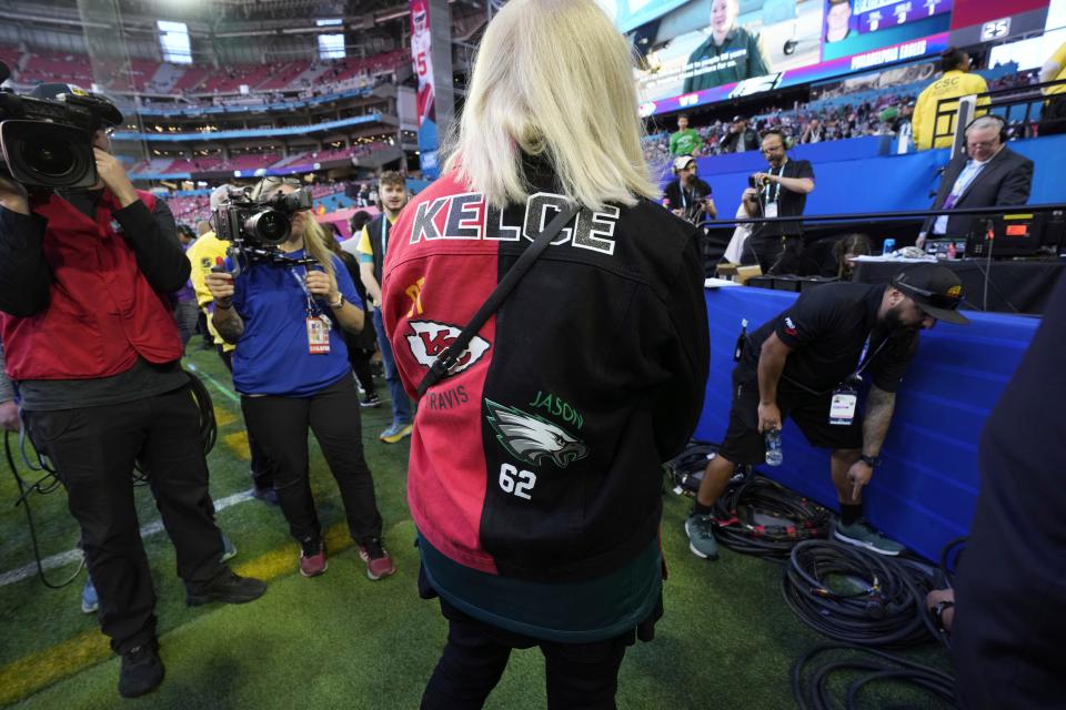 Donna Kelce, mother of Kansas City Chiefs tight end Travis Kelce (87), and Philadelphia Eagles center Jason Kelce (62) seen onfeild during the NFL Super Bowl 57 football game, Sunday, Feb. 12, 2023, in Glendale, Ariz. (AP Photo/Doug Benc)