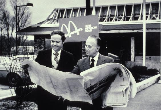 Fred Turner and Ray Kroc the executive leaders of McDonalds Corporation looking at blueprints of future restaurant (photo ca. 1975) (Photo by Everett/REX)