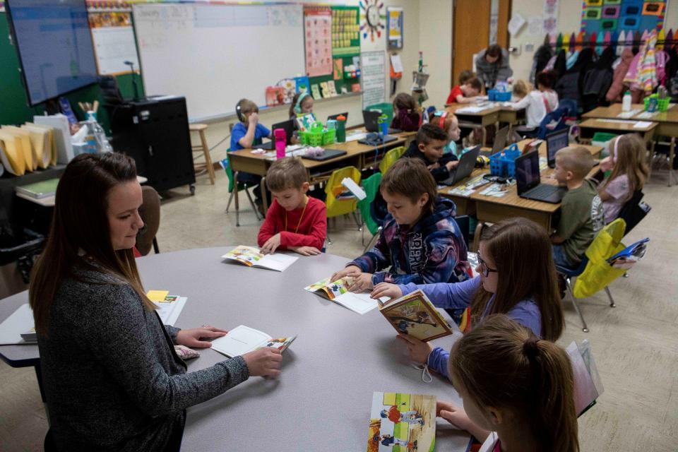 First grade teacher Lydia Alexander reads to her first grade students using books from the elementary schools new Science of Reading Book Room at Huntington Elementary on Jan. 10, 2023 in Chillicothe, Ohio.