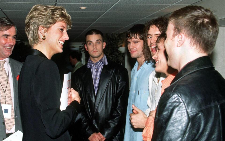 Diana, Princess of Wales with Take That at an Aids benefit concert, Wembley, 1994 - Getty