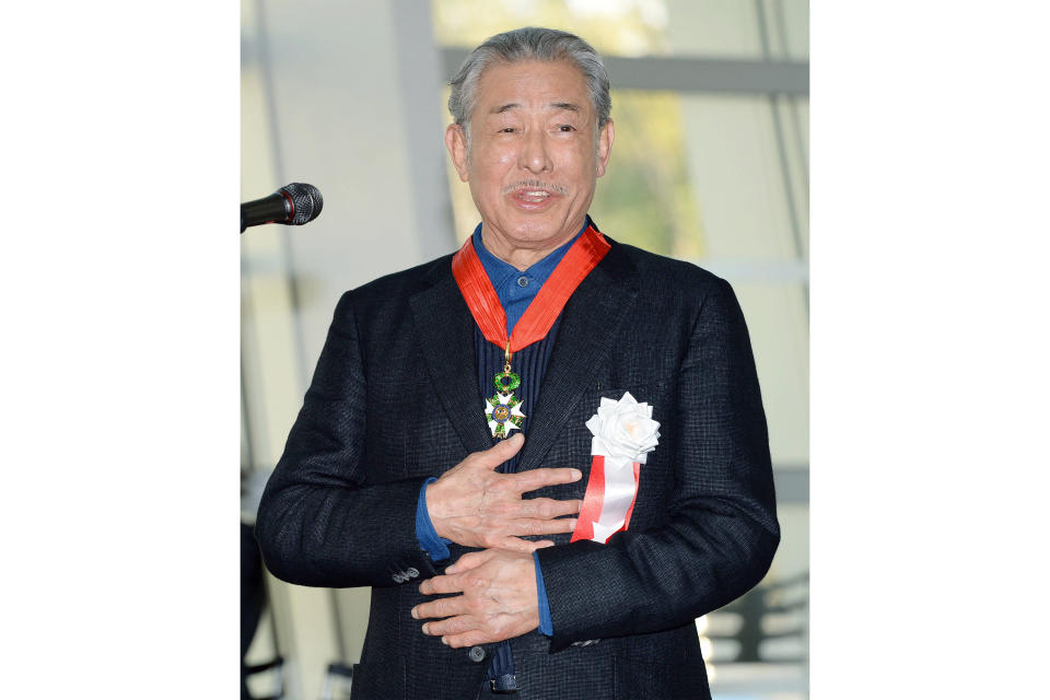 This photo shows Issey Miyake at the National Art Center in Tokyo on March 15, 2016. Miyake, who built one of Japan’s biggest fashion brands and was known for his boldly sculpted, signature pleated pieces, has died. He was 84. Miyake died Aug. 5 of liver cancer, Miyake Design Office said Tuesday, Aug. 9, 2022. (Kyodo News via AP)