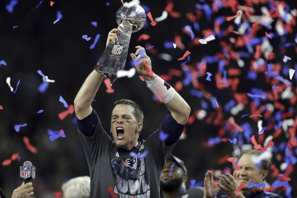 FILE - New England Patriots' Tom Brady raises the Vince Lombardi Trophy after defeating the Atlanta Falcons in overtime at the NFL Super Bowl 51 football game, in Houston, Feb. 5, 2017. Tom Brady has retired after winning seven Super Bowls and setting numerous passing records in an unprecedented 22-year-career. He made the announcement, Tuesday, Feb. 1, 2022, in a long post on Instagram. (AP Photo/Darron Cummings, File)