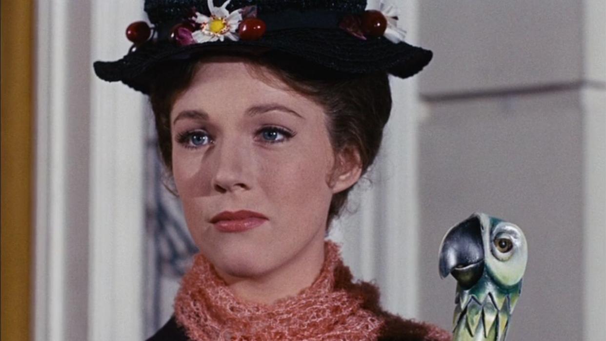  Julie ANdrews as Mary Poppins with bird umbrella. 