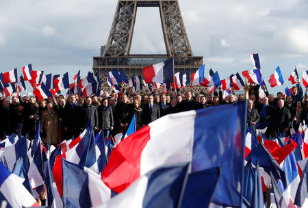 Francois Fillon, former French prime minister, member of The Republicans political party and 2017 presidential election candidate of the French centre-right, attends a meeting at the Trocadero square across from the Eiffel Tower in Paris. REUTERS/Philippe Wojazer