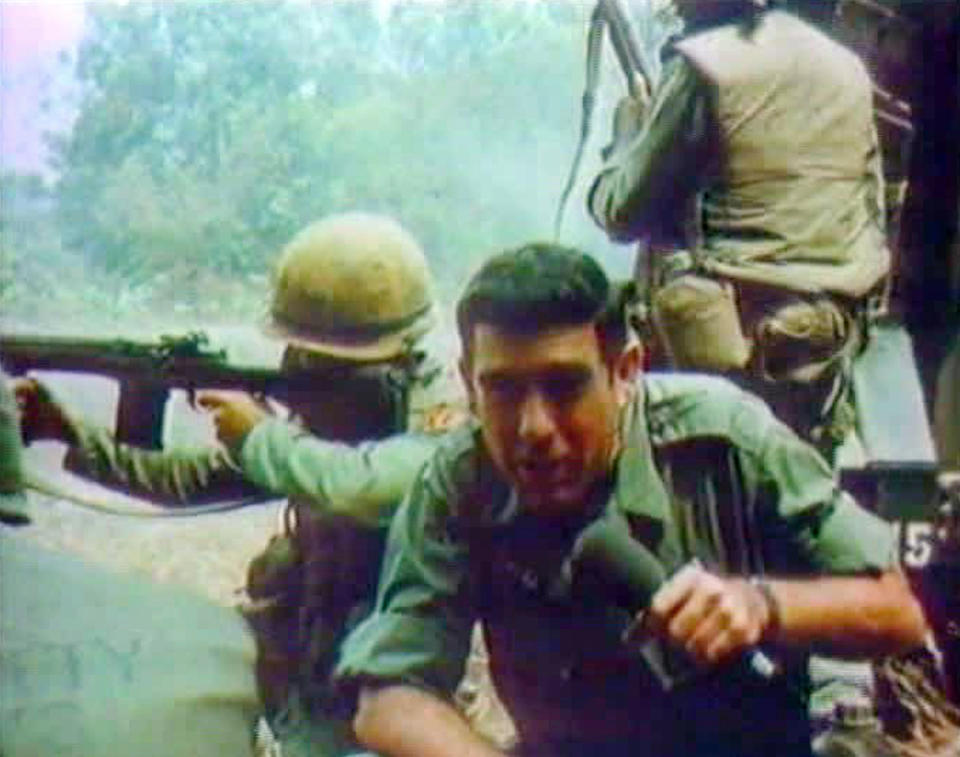 Dan Rather reporting while under fire in Vietham in 1966.
