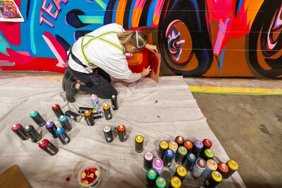 Koda Witsken is a much-in-demand muralist with clients across Central Indiana and the country. On Monday, Feb. 6, 2023, she was working on the last phase of a project at a Target Distribution Center in Indianapolis.