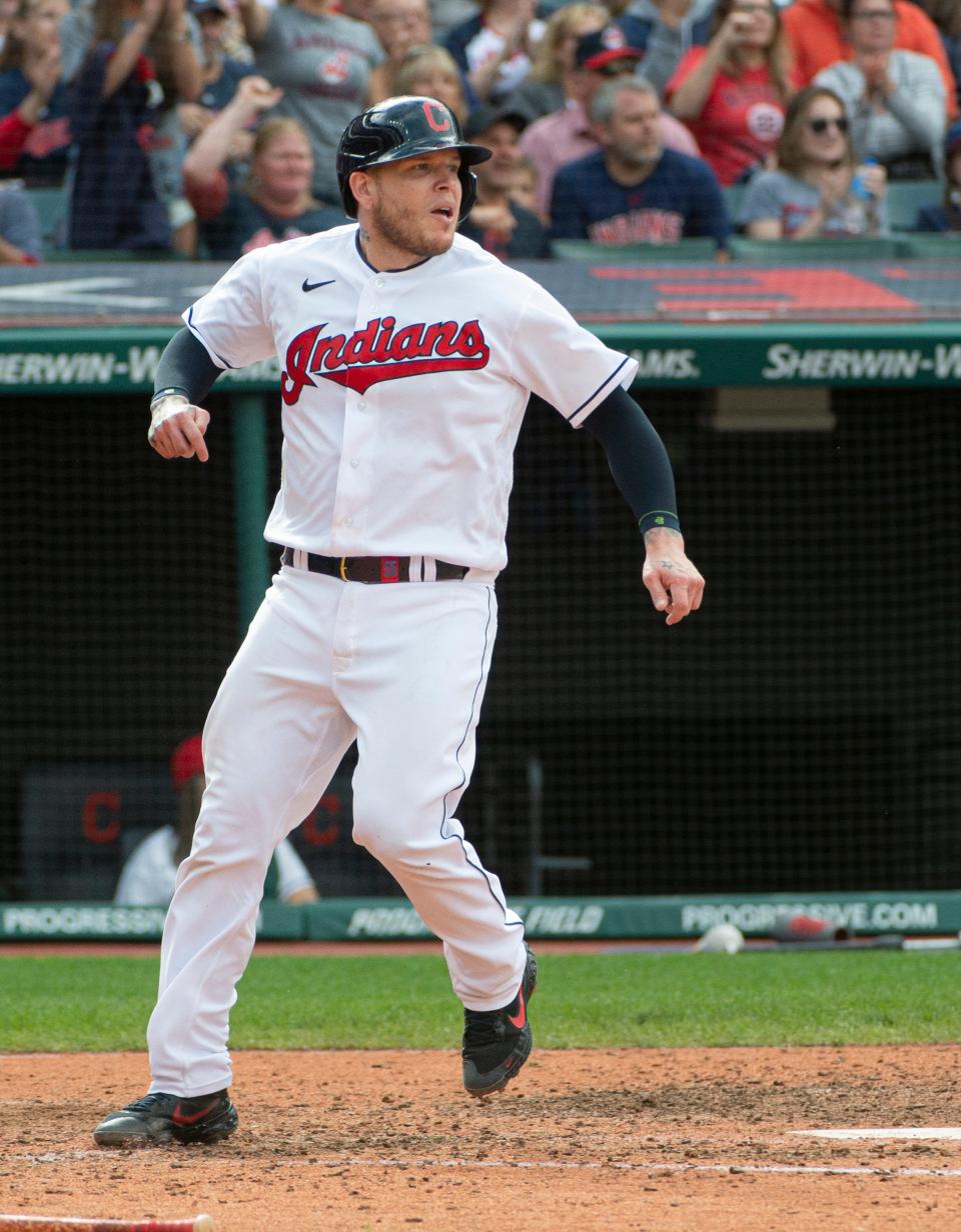 Cleveland has a decision to make on the contract of catcher Roberto Perez, who has a club option for 2022. [Phil Long/Associated Press]