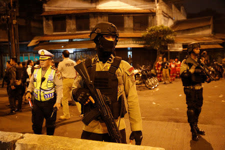Police guard at scene of an explosion in Jakarta, Indonesia May 24, 2017. REUTERS/Darren Whiteside