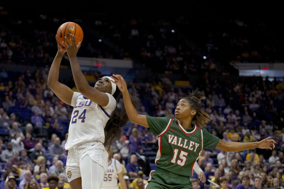 LSU guard Aneesah Morrow (24) shoots against Mississippi Valley State guard Kerrigan Johnson (15) during the first half of an NCAA basketball game on Sunday, Nov. 12, 2023 in Baton Rouge, La. (AP Photo/Matthew Hinton)