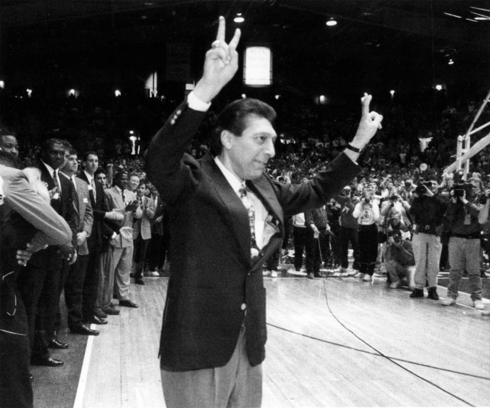 Jim Valvano acknowledges the crowd as he makes a return to Reynolds Coliseum in 1993.