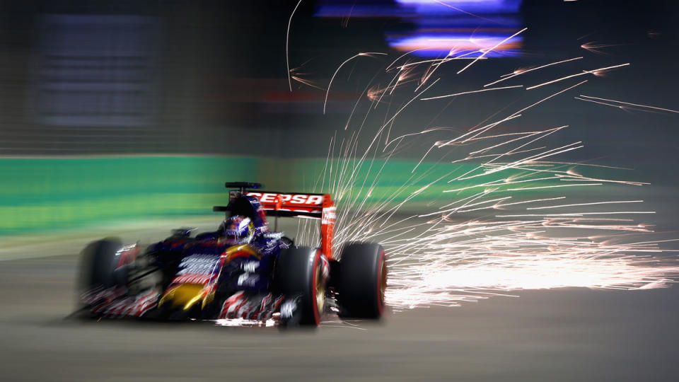 At age 17, Scuderia Toro Rosso's Max Verstappen competes in qualifying during the 2015 Singapore Grand Prix.