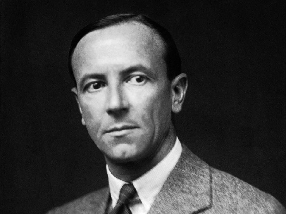 Nobel Prize winner James Chadwick wearing a suit and tie in the 1930s.