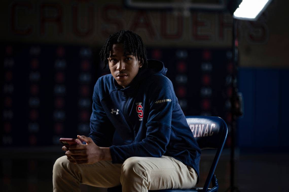 Johnuel “Boogie” Fland poses for a portrait on the basketball court at Archbishop Stepinac High School in White Plains, N.Y. Fland told the Herald-Leader that name, image and likeness monetary opportunities in college have leveled the playing field against alternative basketball pathways like the G-League Ignite and Overtime Elite. Robert Bumsted/AP