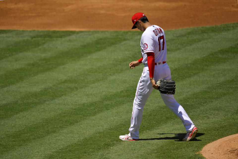 Los Angeles Angels pitcher Shohei Ohtani, of Japan, walks off the mound after being taken out of the baseball game during the second inning against the Houston Astros on Sunday, Aug. 2, 2020, in Anaheim, Calif. (AP Photo/Mark J. Terrill)