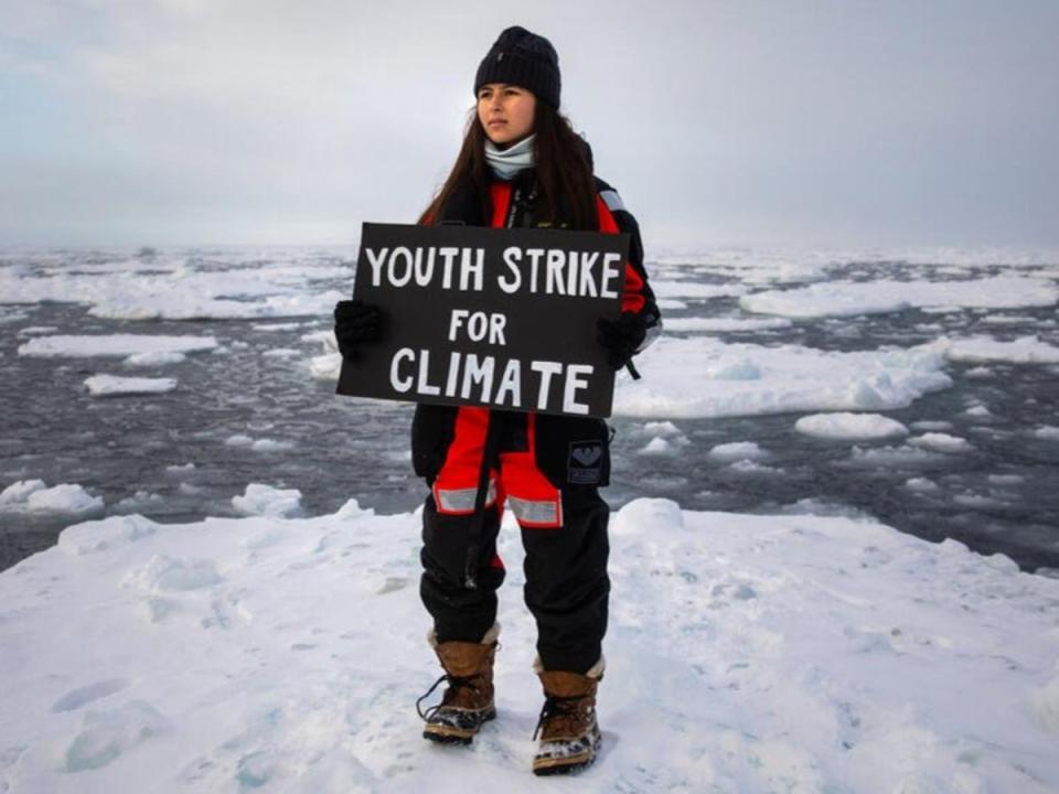 Mya-Rose Craig carrying out a youth climate strike in the Arctic (Greenpeace)