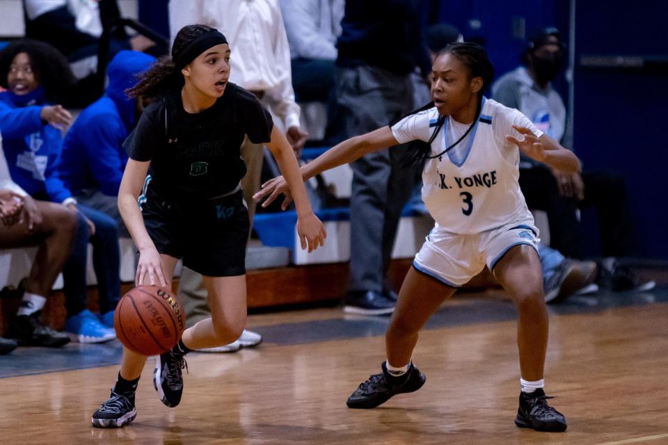 West Port Wolf Pack guard Mileyka Rodriquez Mercado (0) dribbles the ball during the first half against the P.K. Yonge Blue Wave at P.K. Yonge Developmental Research School in Gainesville, Florida, on Wednesday, January 26, 2022.